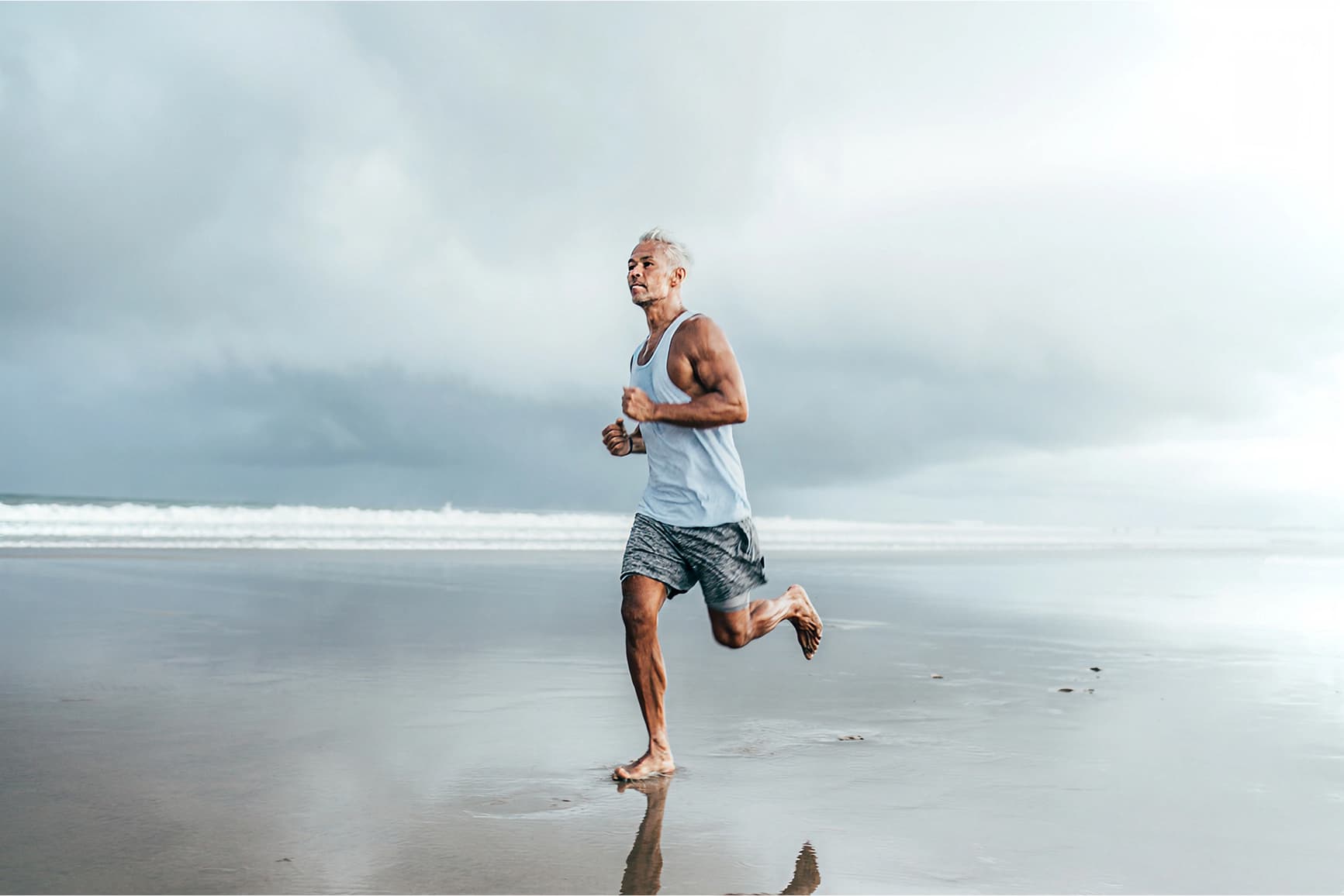 Male running on beach